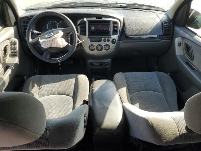 Photo 8 from auction – 2004 MAZDA TRIBUTE LX with VIN 4F2YZ04184KM28033