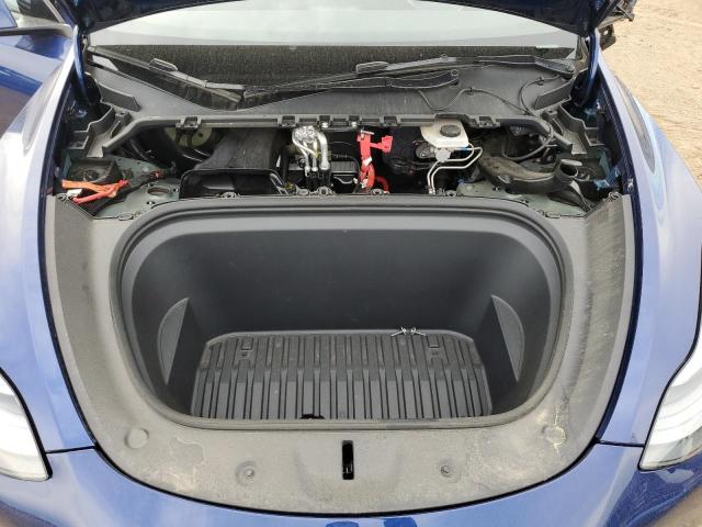 Photo 11 from auction – 2023 TESLA MODEL Y with VIN 7SAYGDEE7PA174654