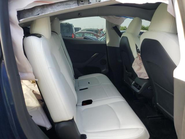 Photo 10 from auction – 2023 TESLA MODEL Y with VIN 7SAYGAEE3PF832567