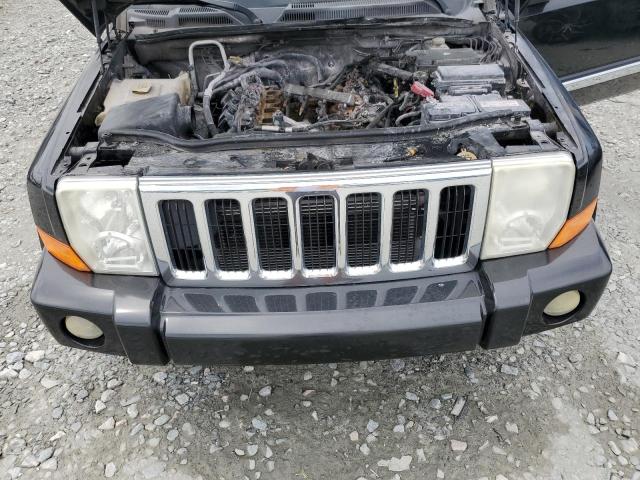 Photo 12 from auction – 2009 JEEP COMMANDER with VIN 1J8HH58T59C553982