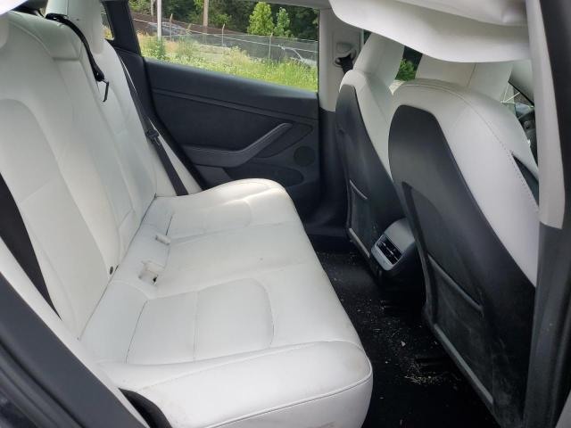 Photo 10 from auction – 2023 TESLA MODEL 3 with VIN 5YJ3E1EB8PF673239