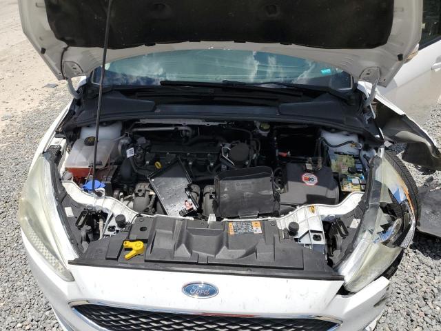 Photo 11 from auction – 2015 FORD FOCUS SE with VIN 1FADP3K2XFL238612