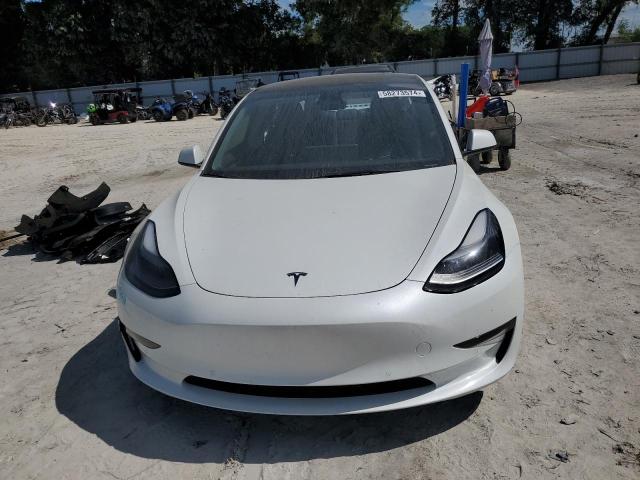 Photo 5 from auction – 2022 TESLA MODEL 3 with VIN 5YJ3E1EB8NF328497