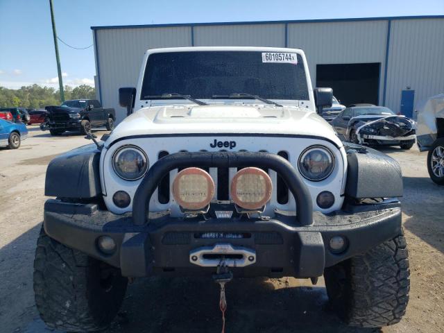Photo 5 from auction – 2013 JEEP WRANGLER U with VIN 1C4BJWFG5DL647012