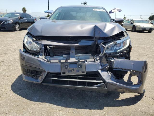 Photo 5 from auction – 2018 HONDA CIVIC LX with VIN 2HGFC2F59JH601972