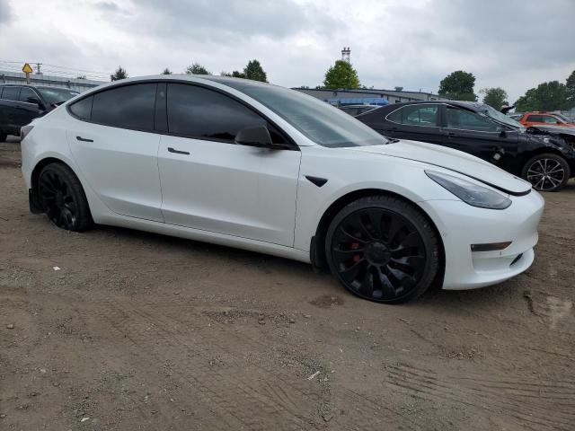 Photo 4 from auction – 2022 TESLA MODEL 3 with VIN 5YJ3E1ECXNF128620
