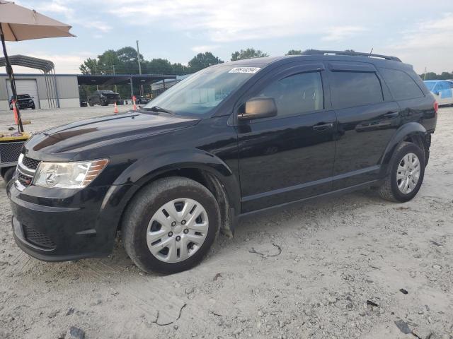 DODGE JOURNEY SE 2017 with VIN 3C4PDCAB4HT676289 - Photo from auction