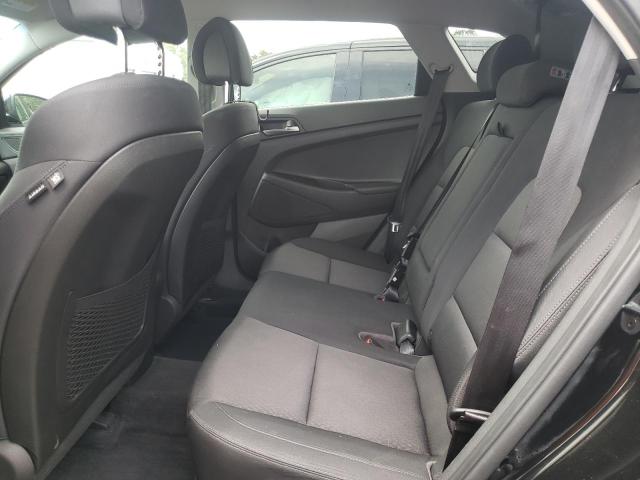 Photo 11 from auction – 2017 HYUNDAI TUCSON SE with VIN KM8J23A40HU323630