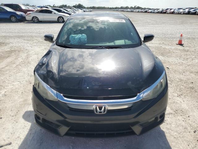Photo 5 from auction – 2016 HONDA CIVIC EX with VIN 2HGFC2F82GH506916