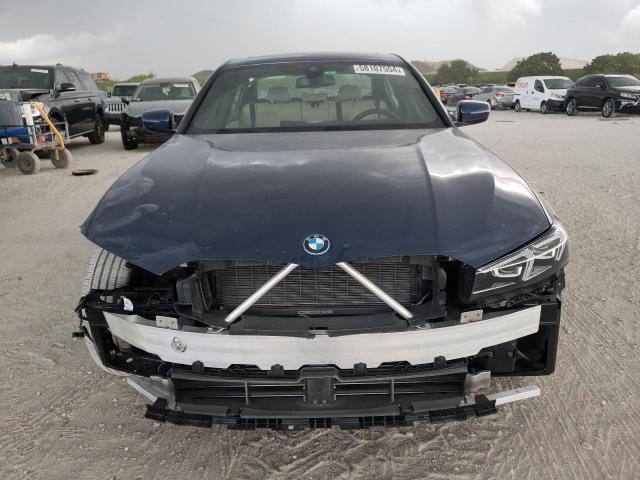 Photo 5 from auction – 2023 BMW 330E with VIN 3MW39FF06P8C84356