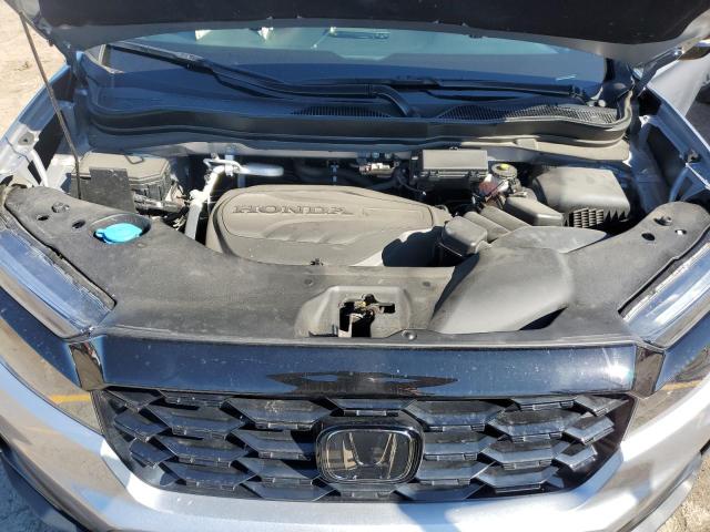 Photo 12 from auction – 2022 HONDA PASSPORT E with VIN 5FNYF8H01NB015846