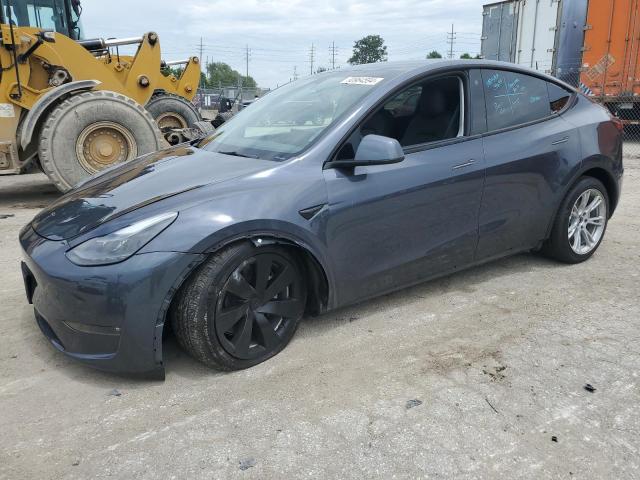 TESLA MODEL Y 2023 with VIN 7SAYGDEE1PF607405 - Photo from auction