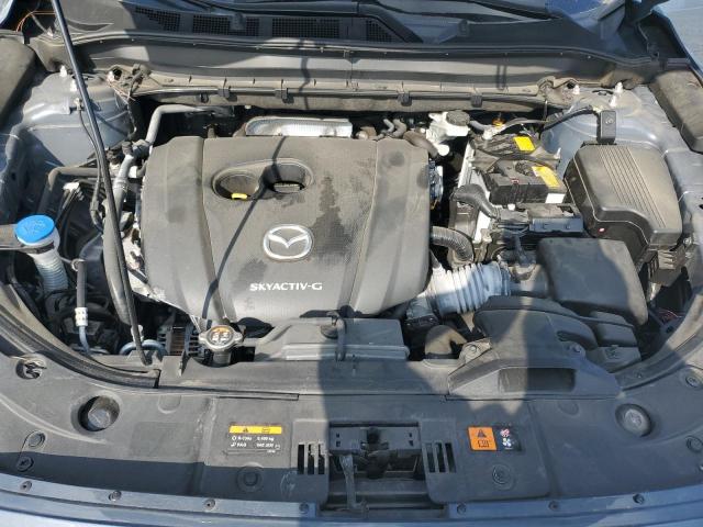 Photo 12 from auction – 2021 MAZDA CX-5 TOURI with VIN JM3KFACM7M0400890