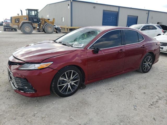TOYOTA CAMRY XLE 2022 with VIN 4T1F11AK2NU026835 - Photo from auction