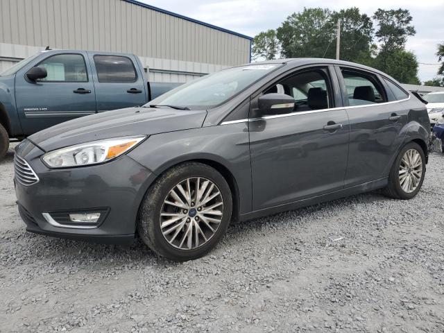 FORD FOCUS 2017 with VIN 1FADP3J23HL287977 - Photo from auction