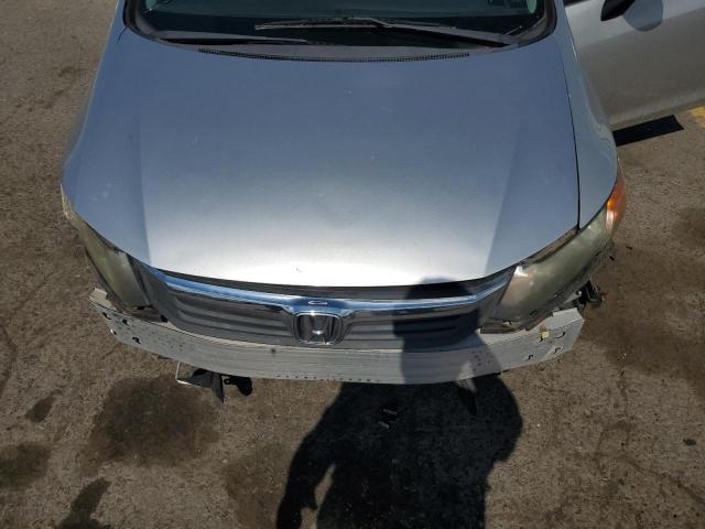 Photo 11 from auction – 2012 HONDA CIVIC LX with VIN 19XFB2F53CE381213