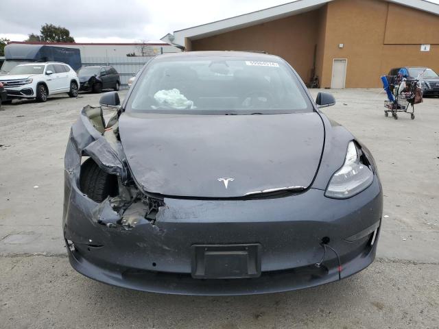Photo 5 from auction – 2018 TESLA MODEL 3 with VIN 5YJ3E1EA7JF060589