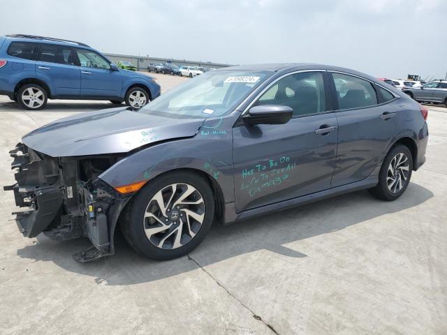 HONDA CIVIC EX 2018 with VIN 2HGFC2F76JH570942 - Photo from auction