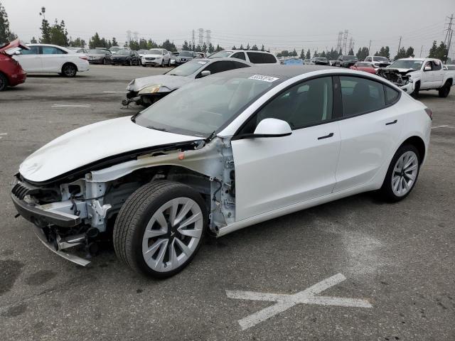 TESLA MODEL 3 2022 with VIN 5YJ3E1EB0NF211786 - Photo from auction
