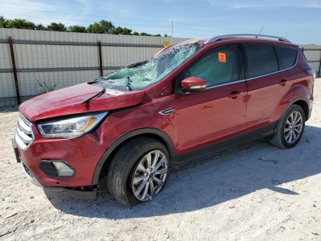 FORD ESCAPE TIT 2018 with VIN 1FMCU0J94JUC06460 - Photo from auction