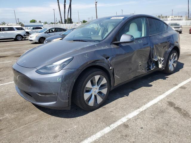 TESLA MODEL Y 2023 with VIN 7SAYGDEE7PA198257 - Photo from auction
