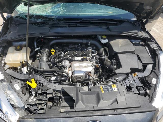 Photo 11 from auction – 2018 FORD FOCUS SE with VIN 1FADP3FE0JL330390