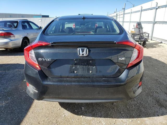 Photo 6 from auction – 2018 HONDA CIVIC LX with VIN 2HGFC2F66JH020051