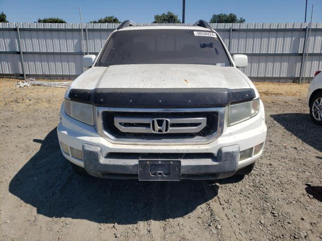 Photo 5 from auction – 2010 HONDA RIDGELINE with VIN 5FPYK1F56AB004084
