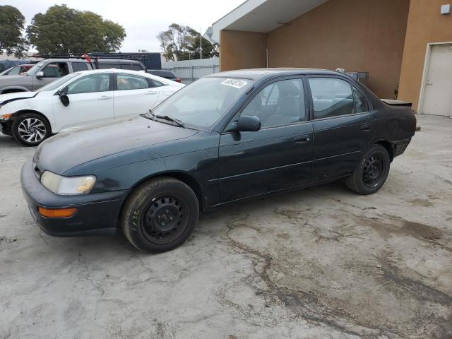 TOYOTA COROLLA 1997 with VIN 1NXBB02E0VZ511635 - Photo from auction