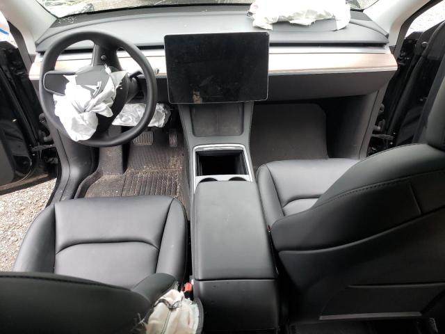 Photo 8 from auction – 2023 TESLA MODEL Y with VIN 7SAYGAEE0PF761327