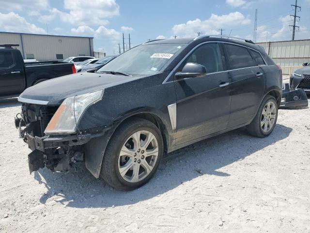 CADILLAC SRX PREMIU 2014 with VIN 3GYFNDE33ES647489 - Photo from auction
