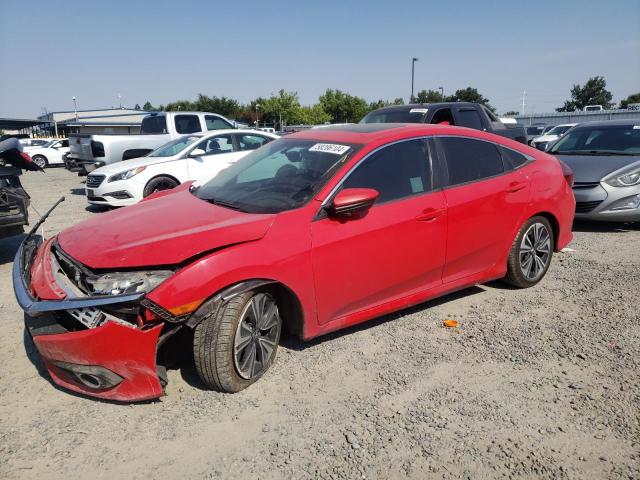 HONDA CIVIC EXL 2016 with VIN 2HGFC1F74GH638304 - Photo from auction