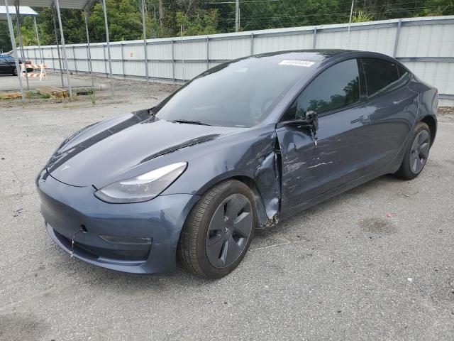 TESLA MODEL 3 2022 with VIN 5YJ3E1EB7NF336252 - Photo from auction