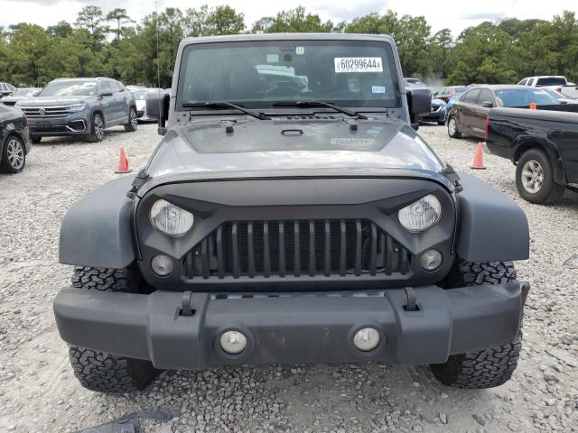 Photo 5 from auction – 2016 JEEP WRANGLER U with VIN 1C4BJWDG3GL302147