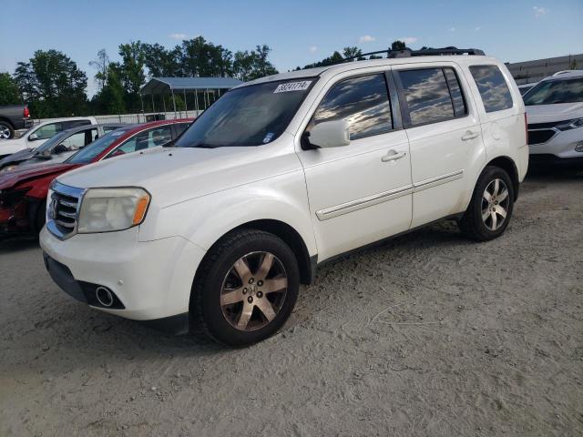 HONDA PILOT TOUR 2012 with VIN 5FNYF4H99CB040689 - Photo from auction