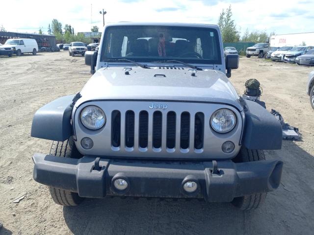 Photo 5 from auction – 2014 JEEP WRANGLER U with VIN 1C4BJWDG9EL225846