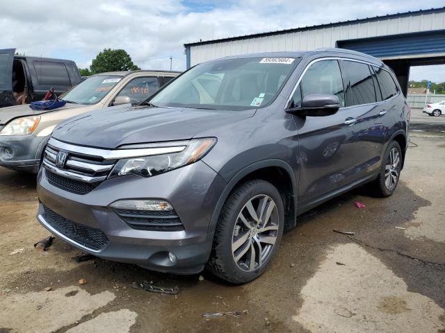 Photo 1 from auction – 2017 HONDA PILOT TOUR with VIN 5FNYF5H96HB001555