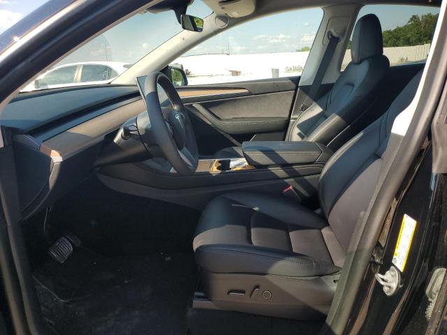 Photo 7 from auction – 2023 TESLA MODEL Y with VIN 7SAYGAEE9PF695067