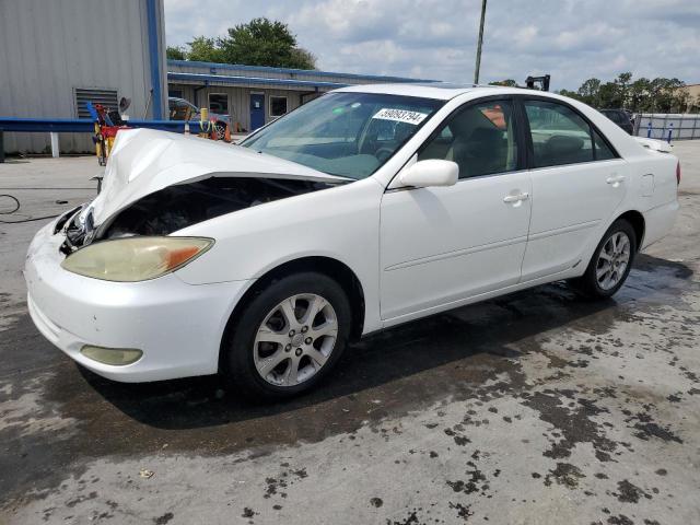 TOYOTA CAMRY LE 2004 with VIN JTDBE32K040259829 - Photo from auction
