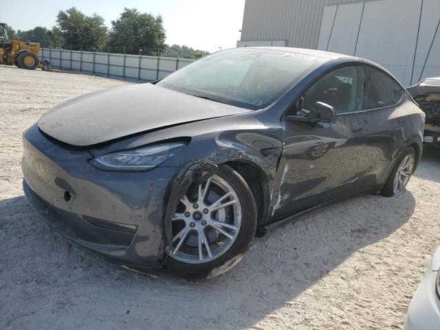 TESLA MODEL Y 2022 with VIN 7SAYGDEE0NA005699 - Photo from auction