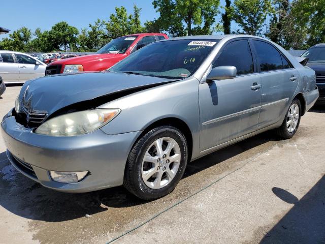 TOYOTA CAMRY LE 2005 with VIN 4T1BF30K05U616190 - Photo from auction