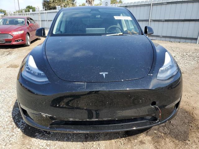 Photo 5 from auction – 2023 TESLA MODEL Y with VIN 7SAYGDEE0PA090336