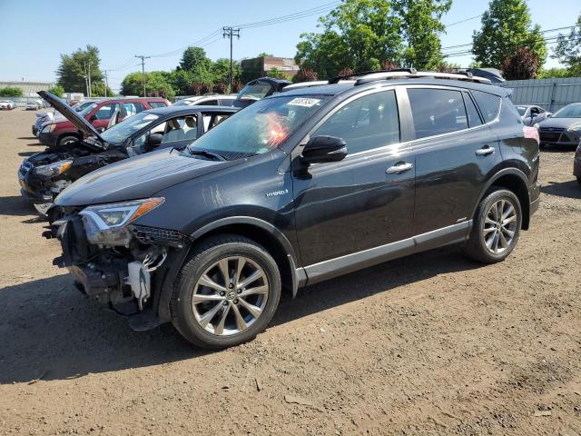 TOYOTA RAV4 HV LI 2017 with VIN JTMDJREVXHD090852 - Photo from auction