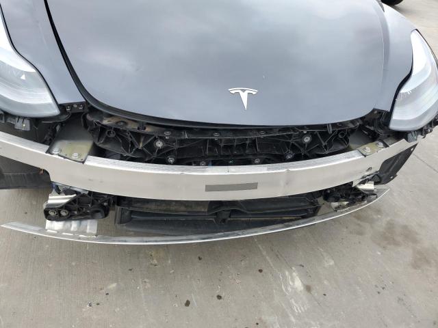 Photo 11 from auction – 2023 TESLA MODEL 3 with VIN 5YJ3E1EA1PF493592