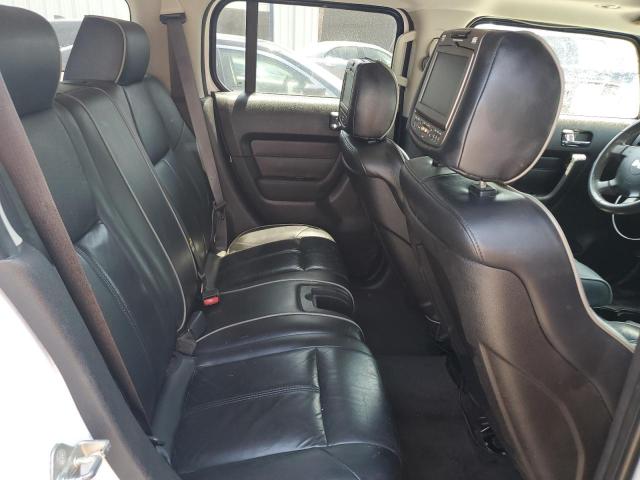 Photo 10 from auction – 2007 HUMMER H3 with VIN 5GTDN13E578110613