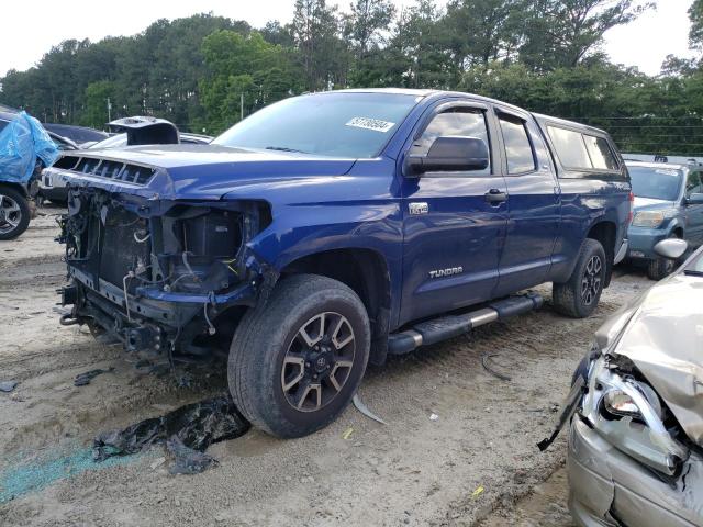 TOYOTA TUNDRA DOU 2014 with VIN 5TFUY5F17EX406802 - Photo from auction