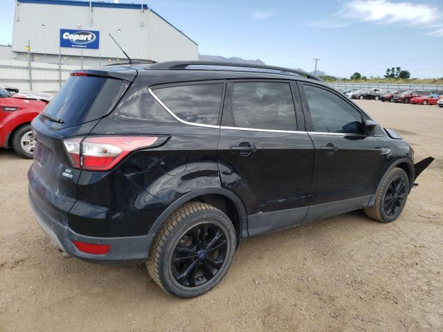 Photo 3 from auction – 2018 FORD ESCAPE SE with VIN 1FMCU9GD2JUC62445