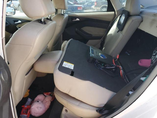 Foto 10 de la subasta – 2012 FORD FOCUS SEL con VIN 1FAHP3H29CL466430