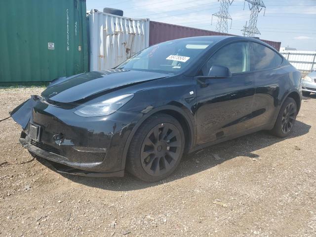 TESLA MODEL Y 2023 with VIN 7SAYGAEE6PF761476 - Photo from auction