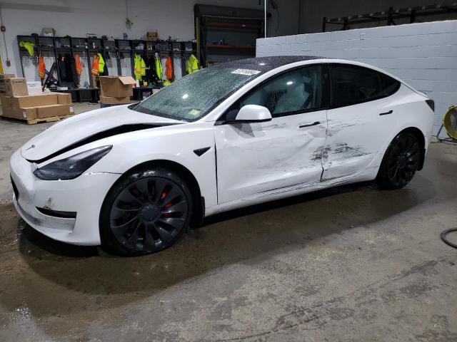 TESLA MODEL 3 2022 with VIN 5YJ3E1EC8NF176889 - Photo from auction